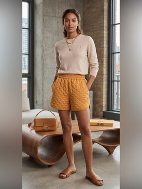 FENDI
Maple Washed Silk Quilted Shorts
Size 42 mustard color